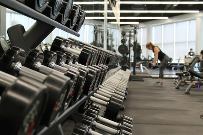 A near-empty gym with one steady regular training